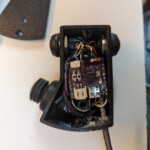 Carefully placing the wires and C3 pico in the case